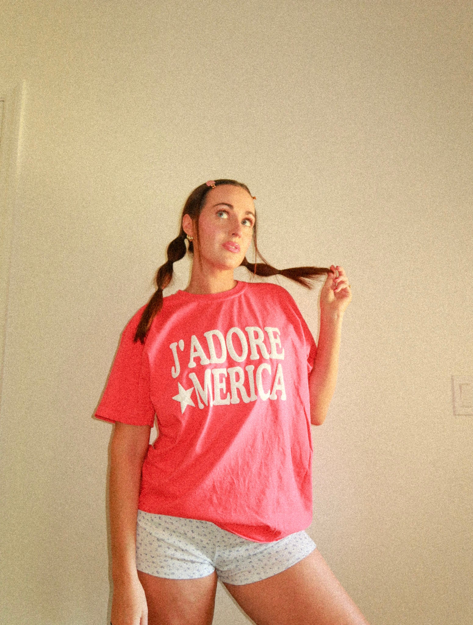 Dynamic walking shot with hair movement, showing shirt in motion